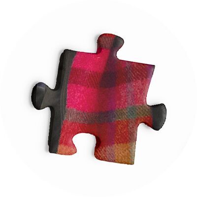 Buntes Puzzlestück in warmen Farben